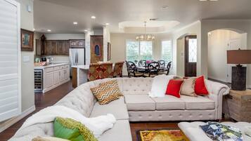 Smart TV, fireplace, books, offices