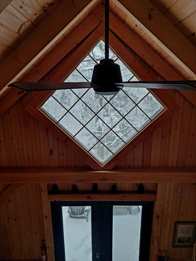 Northwoods Guest Cabin & porch overlooking private woods and stream