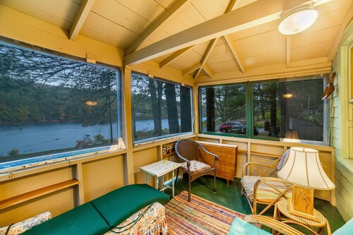 Classic riverfront cottage w/ beautiful water views, WiFi, & screened porches