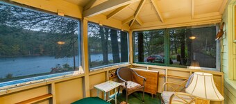 Classic riverfront cottage w/ beautiful water views, WiFi, & screened porches