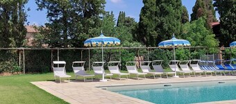 Lovely flat with private covered terrace, pool, large shared garden.