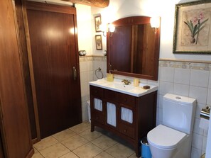 Bathtub, hair dryer, towels, soap