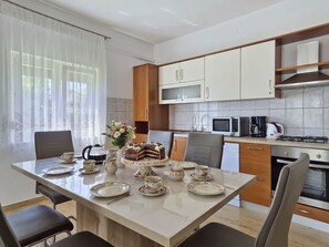 Fridge, microwave, oven, cookware/dishes/utensils