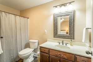 Bathtub, jetted tub, hair dryer, towels