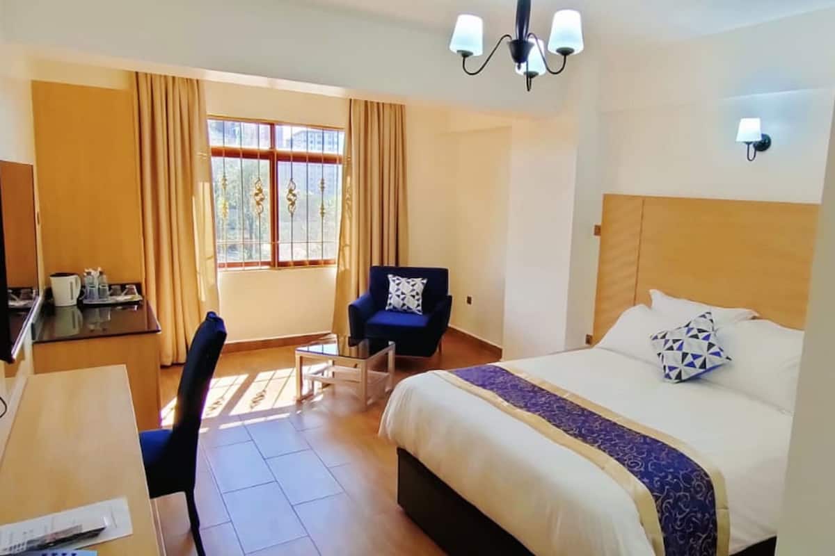 Deluxe kamer | Een minibar, individueel gedecoreerd, individueel gemeubileerd