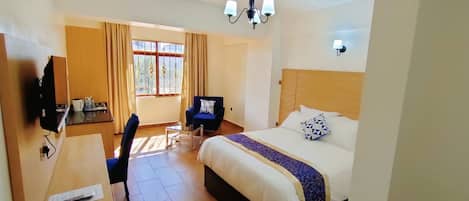 Chambre Deluxe | Minibar, décor unique, ameublement unique, bureau