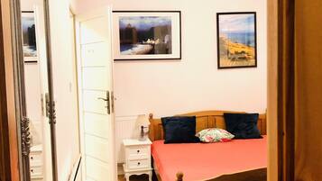 1 bedroom, desk, iron/ironing board, travel cot