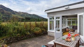 Cottage, nhiều giường | Ban công