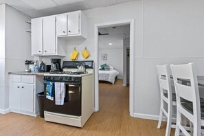 Fridge, stovetop, coffee/tea maker, toaster