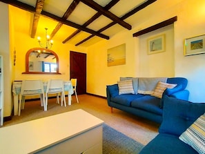 Cottage | Living area | 30-inch TV with cable channels - The Long Barn for Families, Pets & Workers (Penzance)