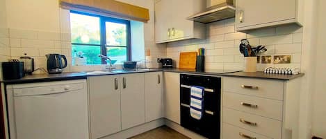 Cottage | Dapur pribadi | Lemari es, microwave, oven, dan kompor