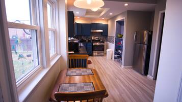 Coffee/tea maker, fridge, microwave, oven