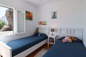 2 bedrooms, in-room safe, iron/ironing board, travel cot