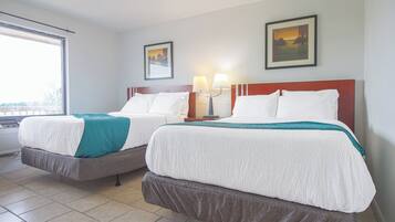 Frette Italian sheets, premium bedding, down comforters, minibar