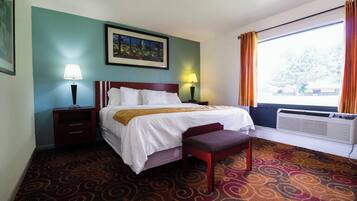 Frette Italian sheets, premium bedding, down comforters, minibar