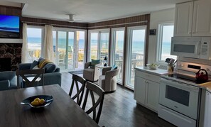 Interior - Oceanfront getaway with panoramic views of golden beaches and crushing waves. (Emerald Isle)