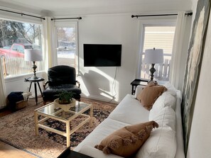 Smart TV, fireplace, books