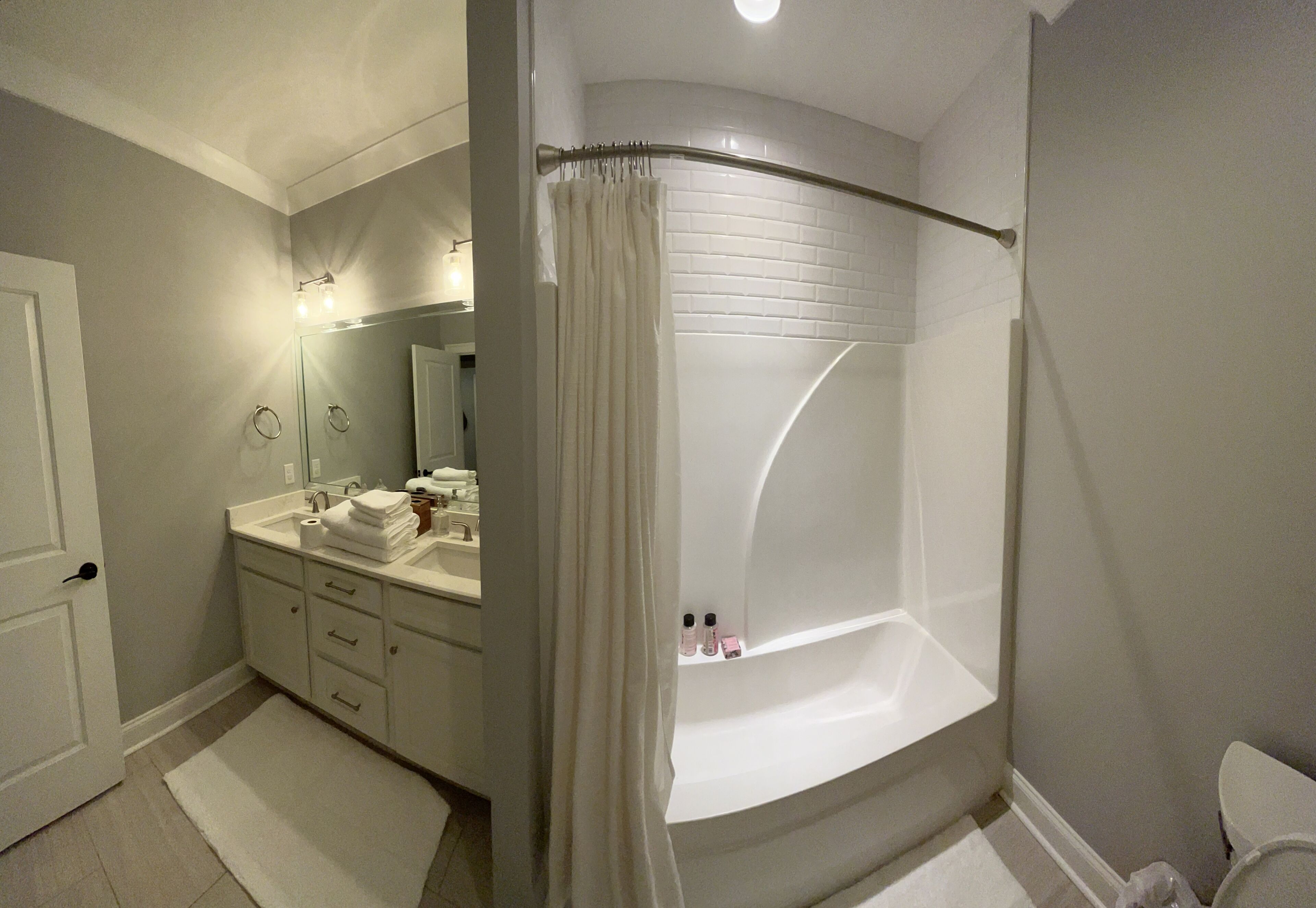 Combined shower/bathtub, hair dryer, towels, soap