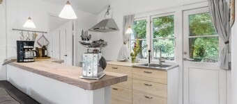 Nice home in NexĂž with kitchen