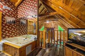 Interior - Romantic cabin, Private Hot Tub, King bed, 1.5 miles to Parkway, Flat Driveway. (Pigeon Forge)
