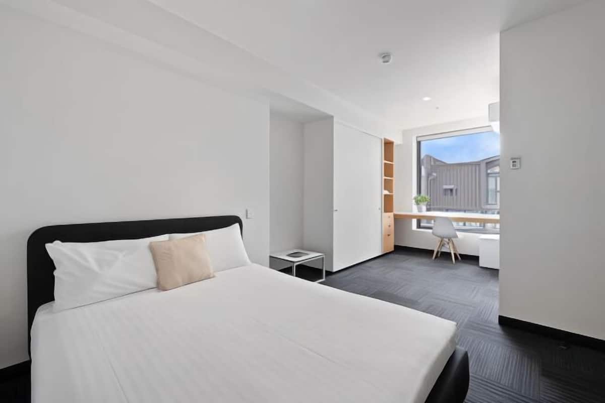 1 bedroom, desk, iron/ironing board, bed sheets