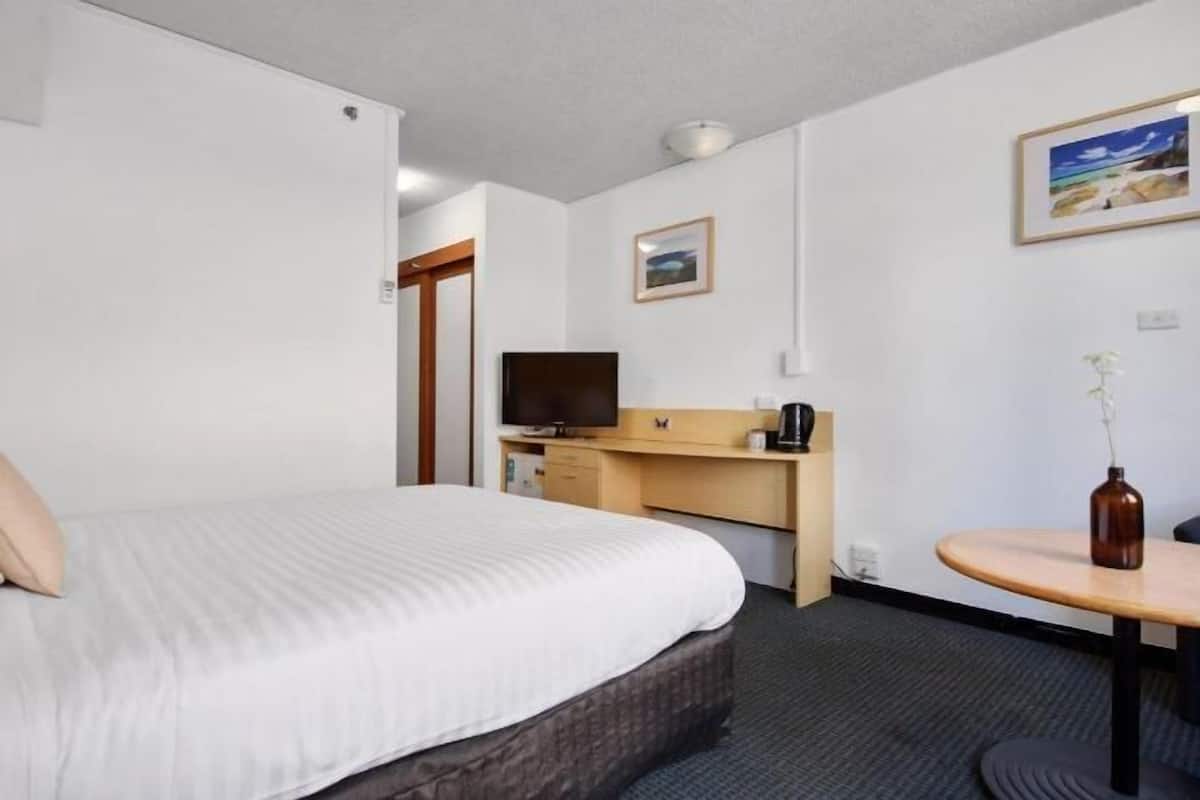 1 bedroom, desk, iron/ironing board, bed sheets