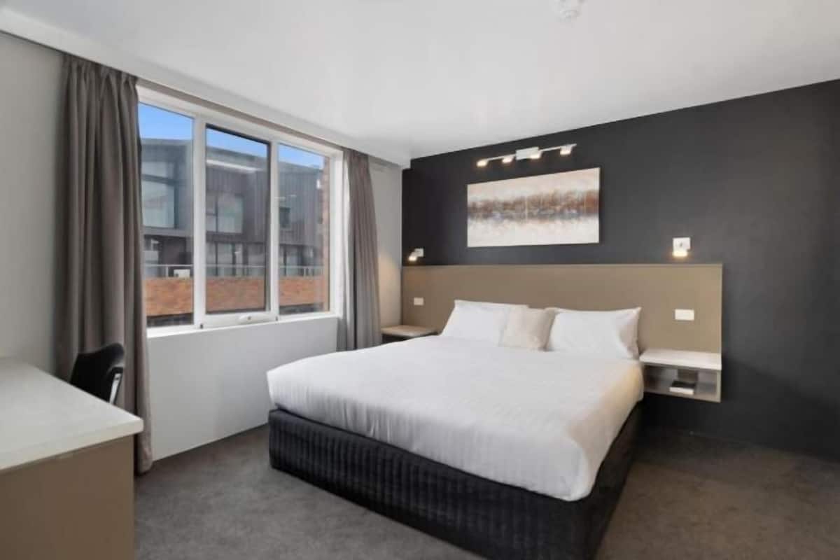 1 bedroom, desk, iron/ironing board, bed sheets