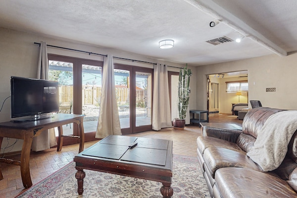 Smart TV, fireplace, books