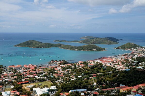 An aerial view of a coastal town with several small islands, clear blue waters, and numerous boats. - Ritz-Carlton St. Thomas (St Thomas)