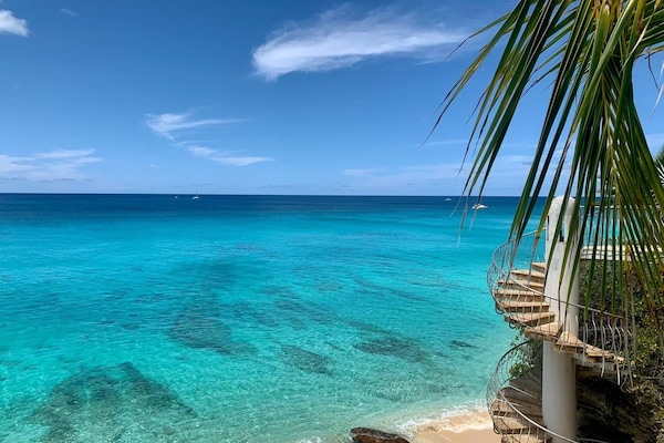 On the beach, sun loungers, beach towels