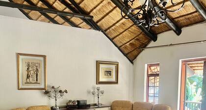 Serene Thatched Roof Retreat in Faerie Glen, Pretoria