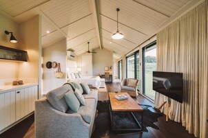 Luxury Pavilion | Living area | Flat-screen TV, fireplace