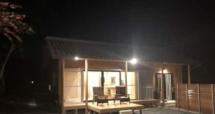 A house in the forest, with a large garden for barbecue and a nearby river to play as much as you like.