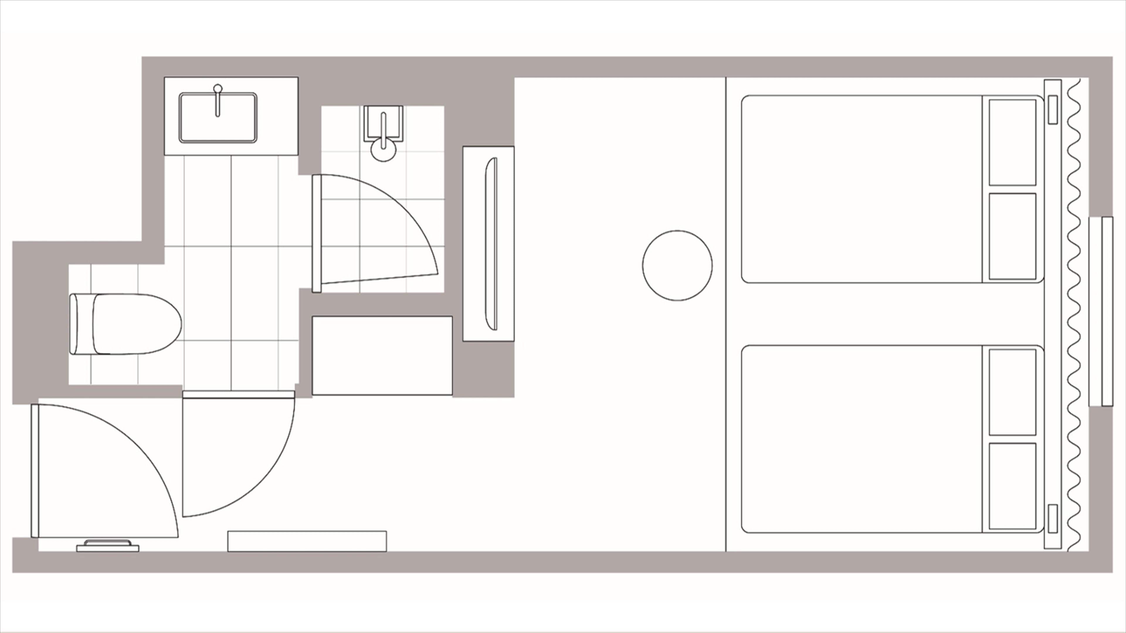 Un plan d’étage d’une chambre d’hôtel comprenant une salle de bain, un lavabo, des toilettes, une douche et un lit.