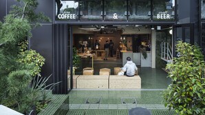 A storefront with a sign reading "fine coffee & craft beer." - all day place shibuya (Tokyo)