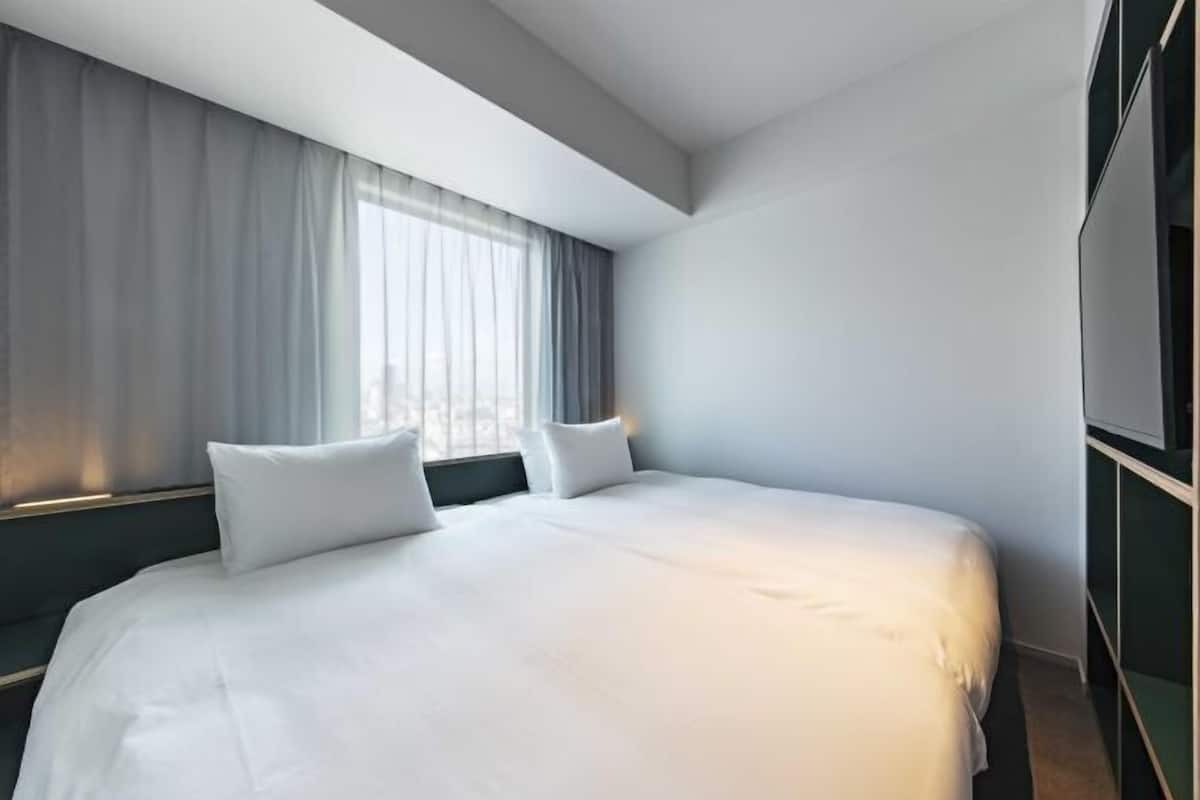 1 quarto, cofres nos quartos, cortinas blackout, quartos à prova de som