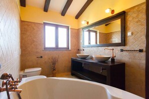 Bathtub, hair dryer, towels