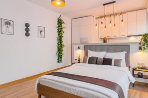 Lägenhet Deluxe | 1 sovrum, sängtillbehör av högsta kvalitet och mörkläggningsgardiner