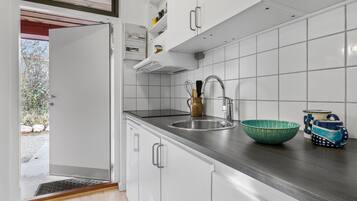 Fridge, stovetop, coffee/tea maker, cookware/dishes/utensils