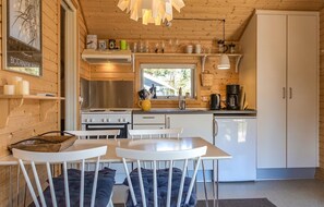 Fridge, stovetop, coffee/tea maker, cookware/dishes/utensils
