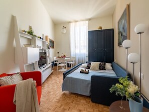 Senior Studio | Living area | 24-inch flat-screen TV with digital channels, TV