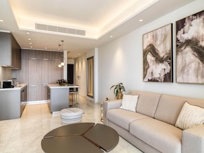 Luxury Apartment, 2 Bedrooms (1W) | Living area | 65-inch LED TV with satellite channels, TV - The Tower at St Raphael Resort (Limassol)