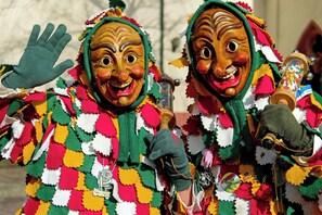 Two individuals in colorful, patterned costumes with a festive appearance. - Garner Hotel Friedrichshafen by IHG (Friedrichshafen)