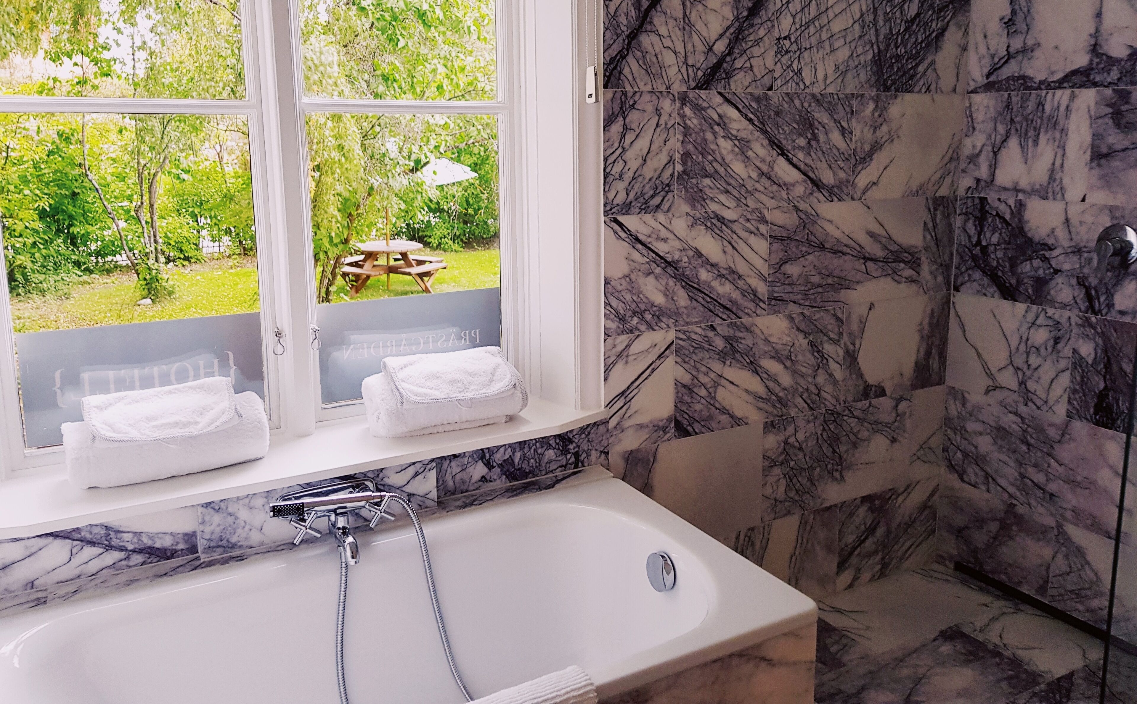 deluxe double room | bathroom | designer toiletries, hair dryer, heated floors, towels