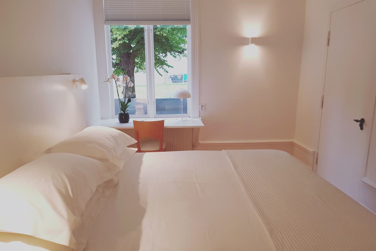deluxe double room | egyptian cotton sheets, premium bedding, pillow-top beds, desk