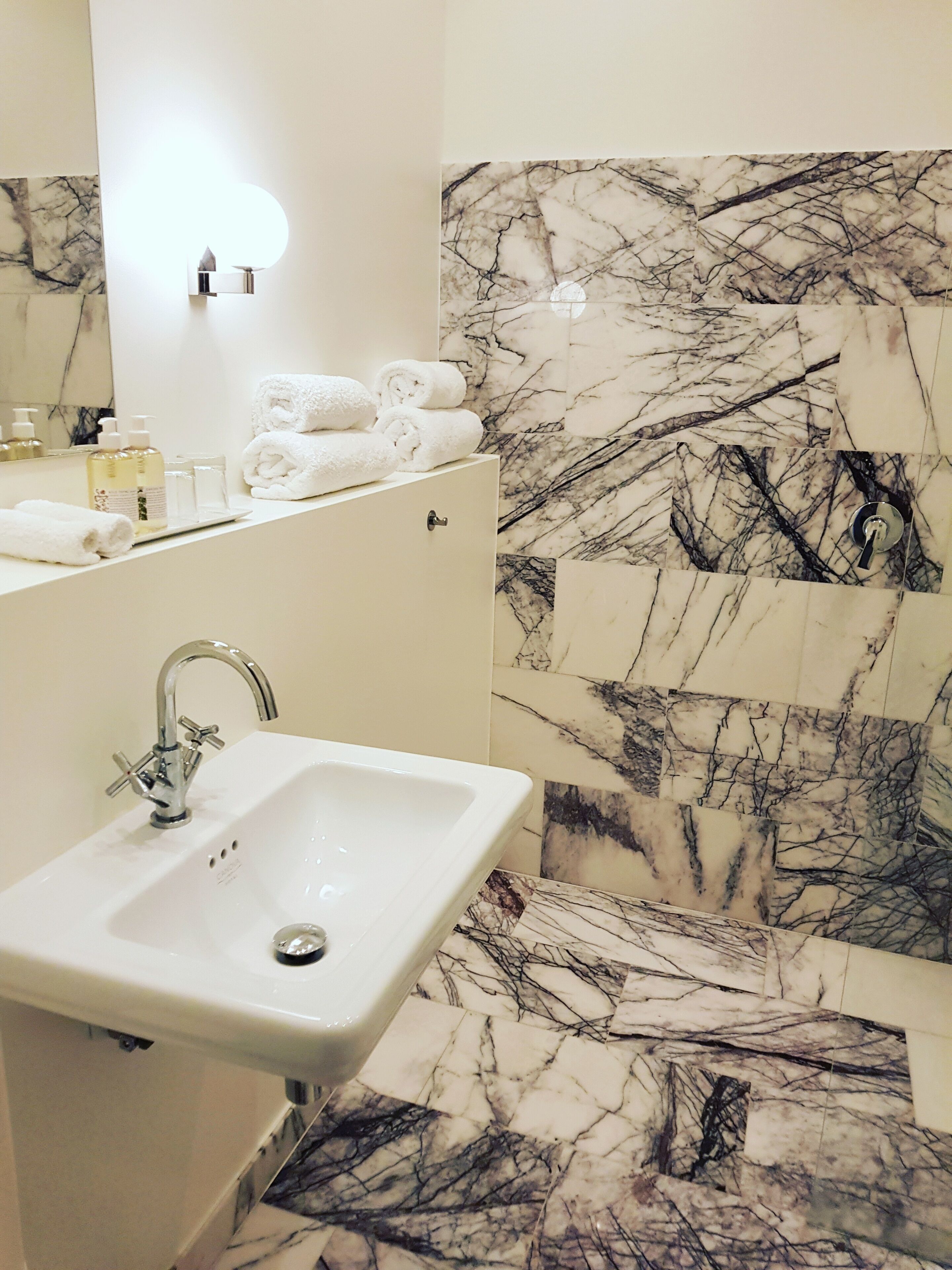 designer toiletries, hair dryer, heated floors, towels