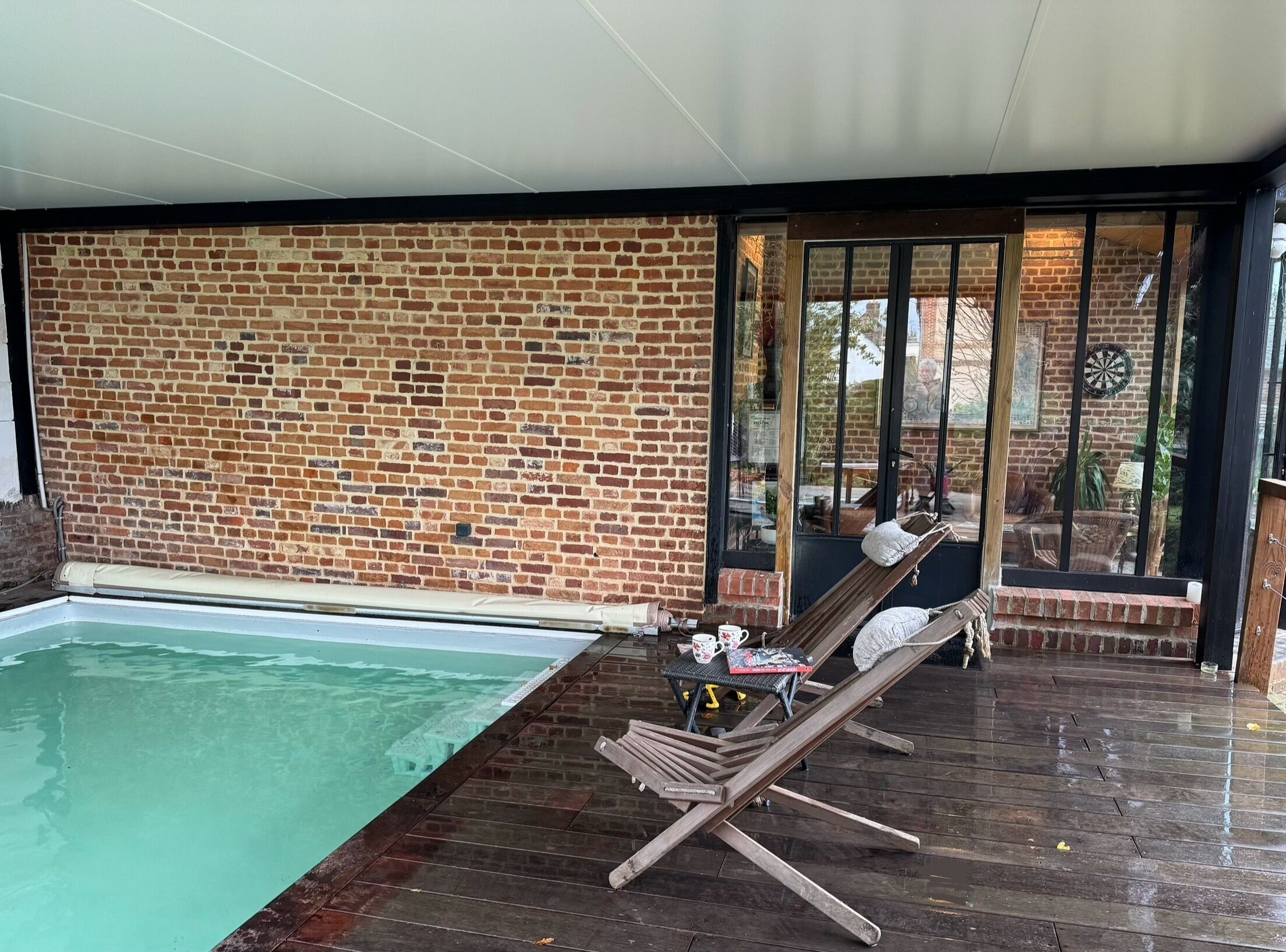 Indoor pool, a heated pool, pool loungers