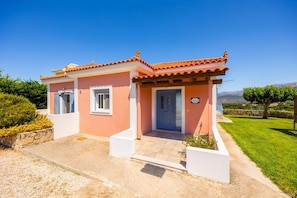 A two-story house with a tiled roof, a front door, and a small porch. - Villa Europe Ena - Two Bedroom Villa, Sleeps 4 (Ionian Islands)