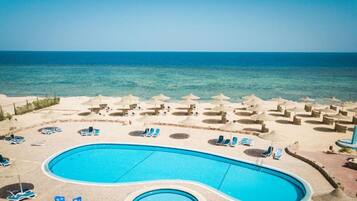 Outdoor pool, pool umbrellas, sun loungers