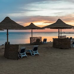 Private beach, white sand, sun loungers, beach umbrellas